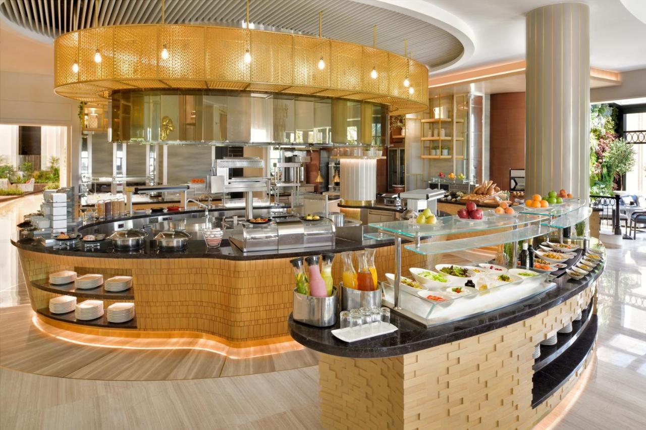 Moevenpick Hotel Bahrain Muharraq Exterior photo The Open Kitchen