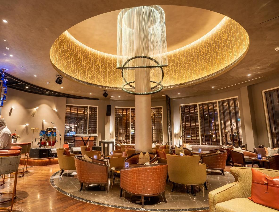 Moevenpick Hotel Bahrain Muharraq Exterior photo The interior of the restaurant