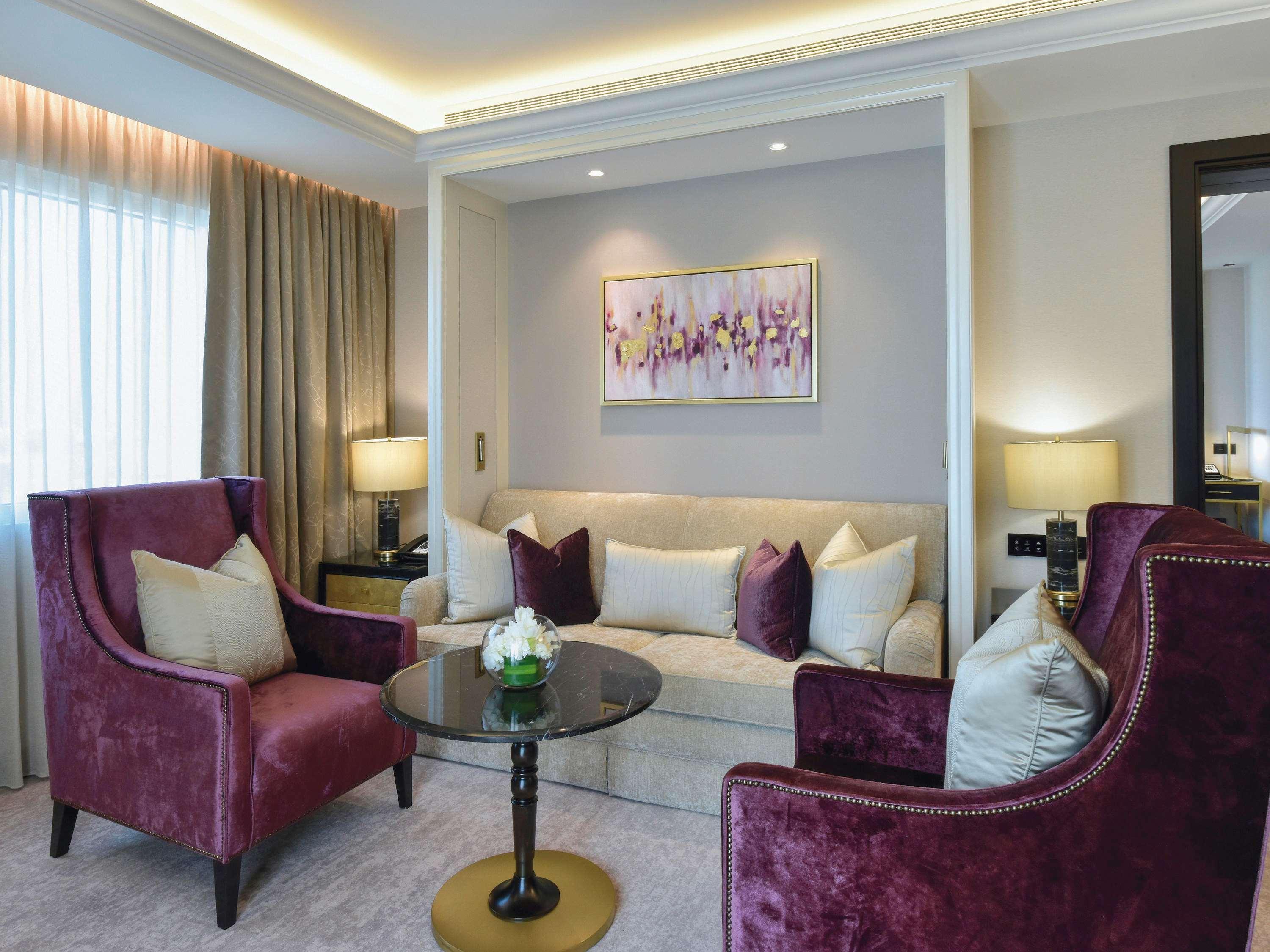 Moevenpick Hotel Bahrain Muharraq Exterior photo A living room in a suite at the hotel
