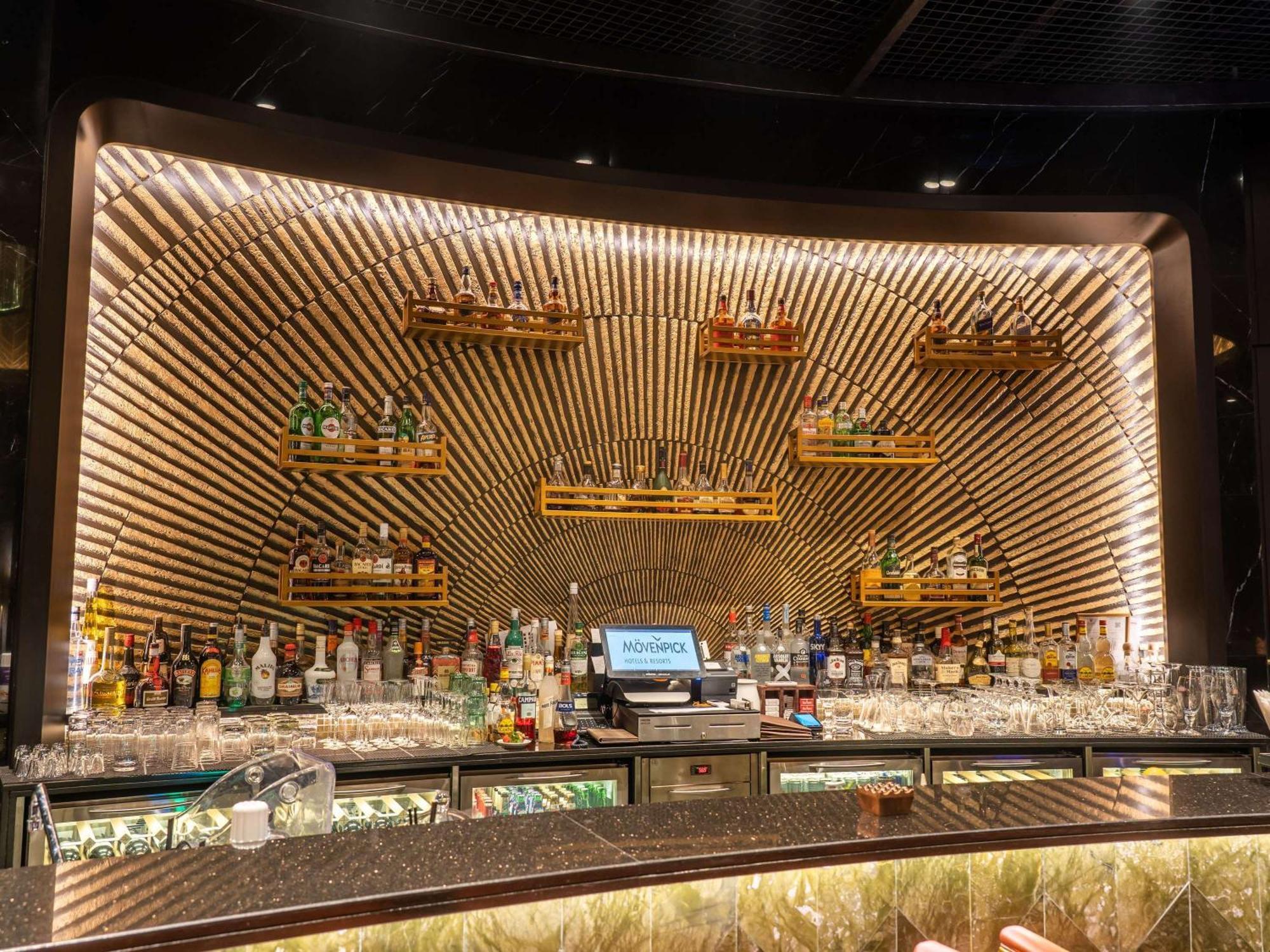 Moevenpick Hotel Bahrain Muharraq Exterior photo The bar at the restaurant