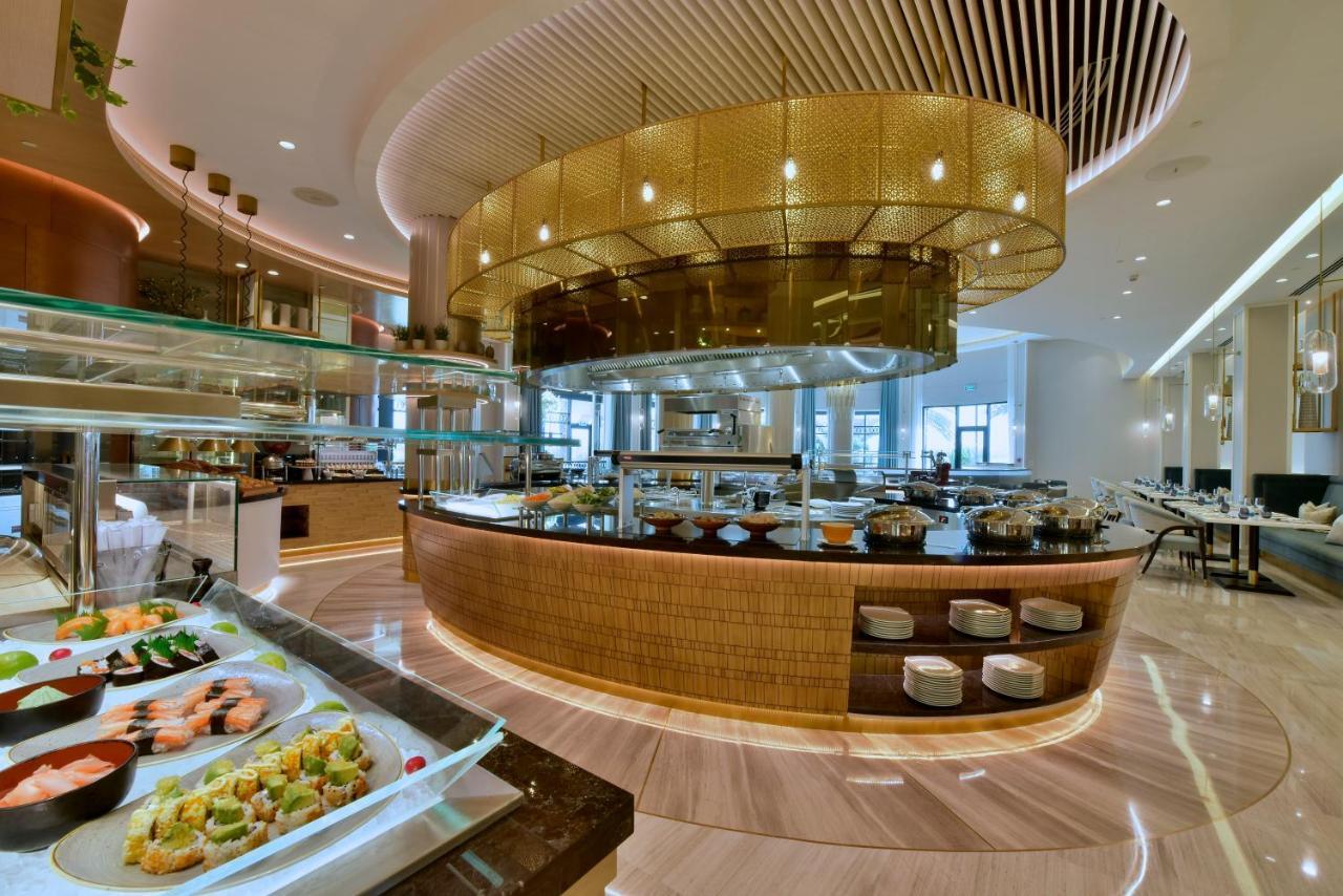Moevenpick Hotel Bahrain Muharraq Exterior photo The buffet at the hotel